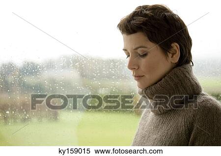 Mid adult woman looking serious View Large Photo Image Stock Photography - Mid adult woman looking serious. Fotosearch