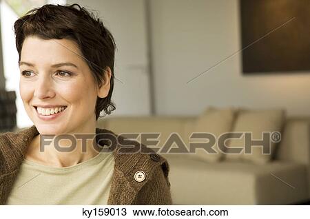 Mid adult woman smiling View Large Photo Image Stock Image - Mid adult woman smiling. Fotosearch