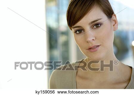 Portrait of a young woman thinking View Large Photo Image Stock Photograph - Portrait of a young woman thinking. Fotosearch