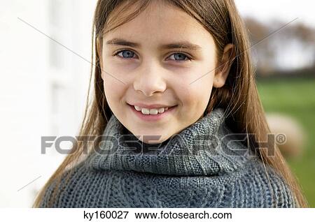 Portrait of a girl smiling View Large Photo Image Stock Photo - Portrait of a girl smiling. Fotosearch