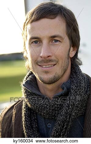 Portrait of a mid adult man smiling View Large Photo Image Picture - Portrait of a mid adult man smiling. Fotosearch