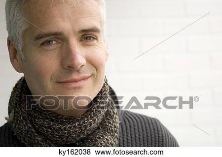 Portrait of a mature man smiling View Large Photo Image Stock Photo - Portrait of a mature man smiling. Fotosearch