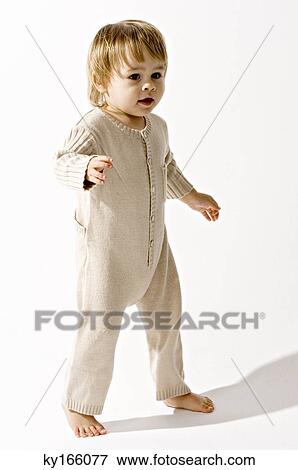 Baby boy walking View Large Photo Image Stock Photo - Baby boy walking. Fotosearch