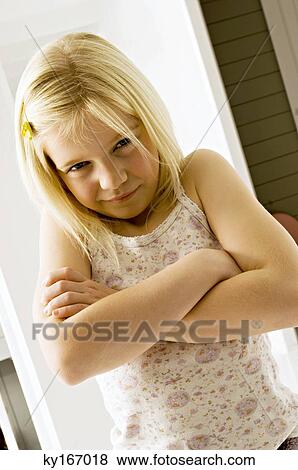 Portrait of a girl making a face View Large Photo Image Stock Photo - Portrait of a girl making a face. Fotosearch