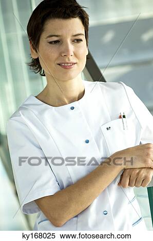 Close-up of a female doctor smiling View Large Photo Image Stock Photography - Close-up of a female doctor smiling. Fotosearch