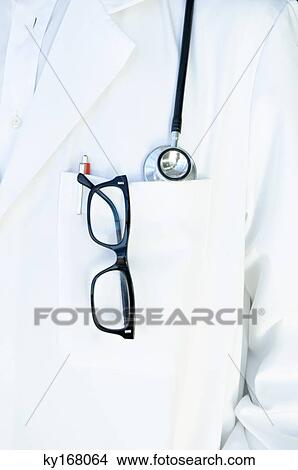 Close-up of eyeglasses and a pen in a lab coat of a doctor View Large Photo Image Picture - Close-up of eyeglasses and a pen in a lab coat of a doctor. Fotosearch