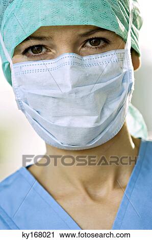 Portrait of a female doctor wearing surgical scrubs View Large Photo Image Stock Image - Portrait of a female doctor wearing surgical scrubs. Fotosearch