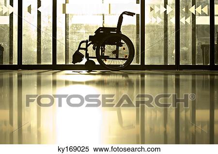 Wheelchair in a corridor of a hospital View Large Photo Image Stock Photography - Wheelchair in a corridor of a hospital. Fotosearch