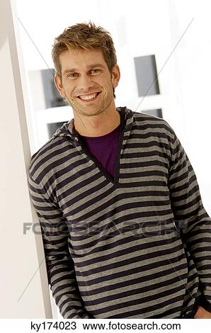 Portrait of a mid adult man smiling View Large Photo Image Stock Image - Portrait of a mid adult man smiling. Fotosearch
