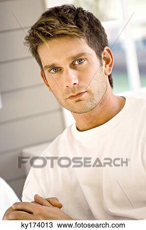 Portrait of a mid adult man View Large Photo Image Stock Image - Portrait of a mid adult man. Fotosearch
