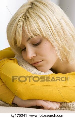 Close-up of a young woman sleeping View Large Photo Image Stock Image - Close-up of a young woman sleeping. Fotosearch