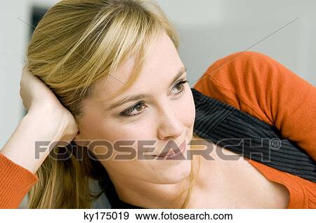 Stock Photo - Close-up of a young woman smiling. Fotosearch