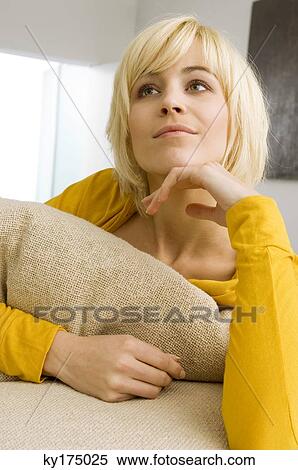 Young woman day dreaming View Large Photo Image Stock Photography - Young woman day dreaming. Fotosearch