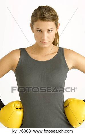 Portrait of a female boxer with arms akimbo View Large Photo Image Stock Photo - Portrait of a female boxer with arms akimbo. Fotosearch