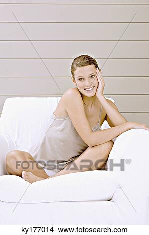 Picture - Portrait of a young woman smiling. Fotosearch