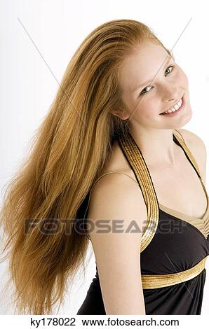 Portrait of a young woman smiling View Large Photo Image Stock Image - Portrait of a young woman smiling. Fotosearch