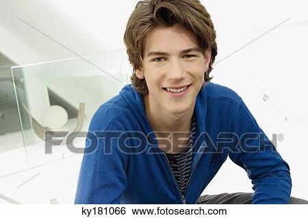 Stock Photograph - Portrait of a teenage boy smiling. Fotosearch
