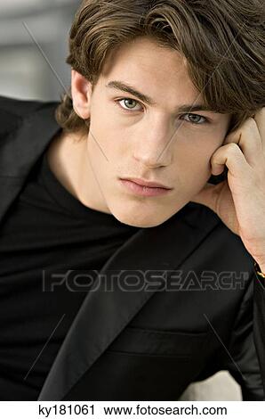 Portrait of a teenage boy thinking View Large Photo Image Stock Image - Portrait of a teenage boy thinking. Fotosearch