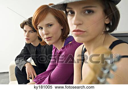 Portrait of two young women with a teenage boy View Large Photo Image Stock Photography - Portrait of two young women with a teenage boy. Fotosearch