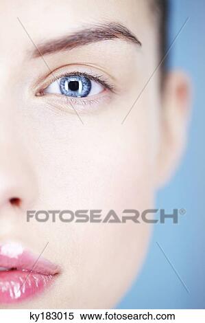 Close-up of woman's eye and lips View Large Photo Image Stock Photography - Close-up of woman's eye and lips. Fotosearch