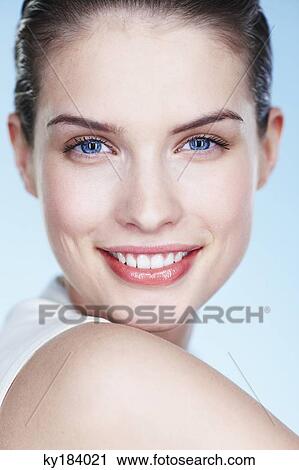 Portrait of young smiling woman View Large Photo Image Stock Image - Portrait of young smiling woman. Fotosearch