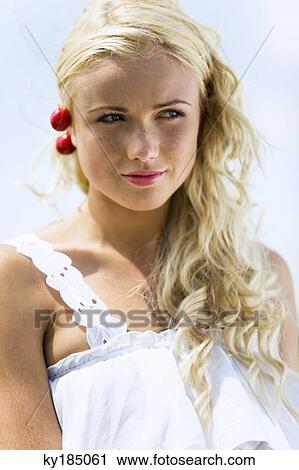 Portrait of young woman with cherries View Large Photo Image Stock Image - Portrait of young woman with cherries. Fotosearch