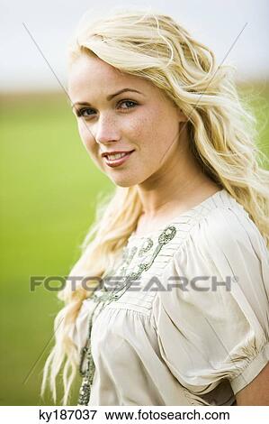 Portrait of a young woman View Large Photo Image Stock Photo - Portrait of a young woman. Fotosearch