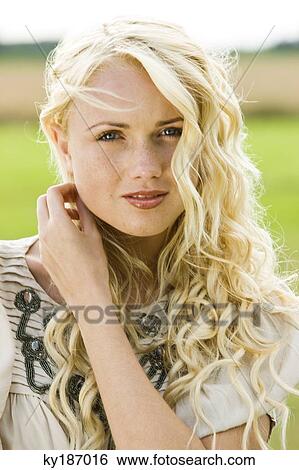 Portrait of a young woman View Large Photo Image Stock Photograph - Portrait of a young woman. Fotosearch