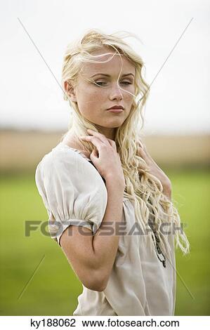 Thoughtful young woman View Large Photo Image Stock Image - Thoughtful young woman. Fotosearch