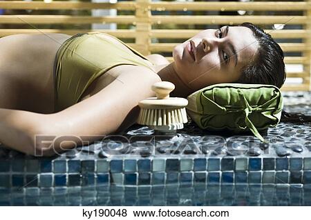 Woman taking a spa treatment View Large Photo Image Stock Photo - Woman taking a spa treatment. Fotosearch