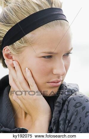 Close-up of a woman thinking View Large Photo Image Stock Photography - Close-up of a woman thinking. Fotosearch