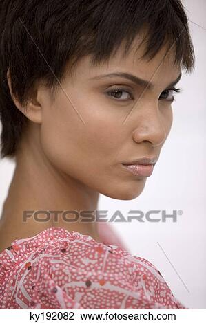Portrait of a woman looking sad View Large Photo Image Stock Image - Portrait of a woman looking sad. Fotosearch