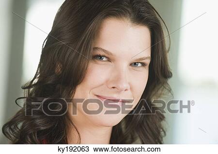 Portrait of a woman smiling View Large Photo Image Stock Image - Portrait of a woman smiling. Fotosearch