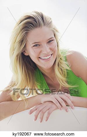 Portrait of a woman smiling View Large Photo Image Stock Photo - Portrait of a woman smiling. Fotosearch