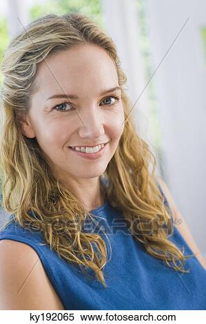 Portrait of a woman smiling View Large Photo Image Stock Photography - Portrait of a woman smiling. Fotosearch