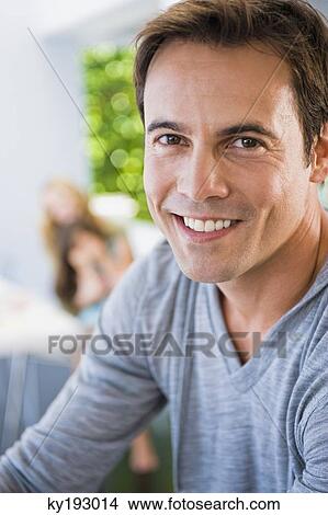 Portrait of a man smiling View Large Photo Image Picture - Portrait of a man smiling. Fotosearch