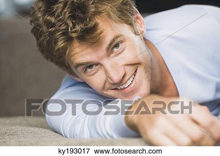 Stock Photo - Portrait of a man smiling. Fotosearch