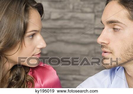 Affectionate couple looking at each other View Large Photo Image Stock Photo - Affectionate couple looking at each other. Fotosearch