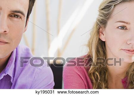 Close-up of a couple ignoring each other View Large Photo Image Stock Image - Close-up of a couple ignoring each other. Fotosearch