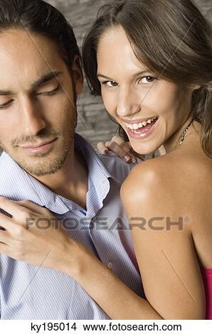 Close-up of a couple View Large Photo Image Picture - Close-up of a couple. Fotosearch