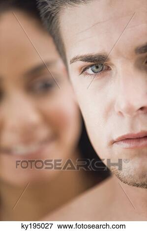 Close-up of a couple View Large Photo Image Stock Photo - Close-up of a couple. Fotosearch