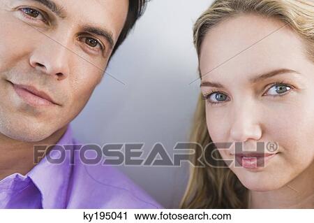 Portrait of a couple smiling View Large Photo Image Stock Image - Portrait of a couple smiling. Fotosearch