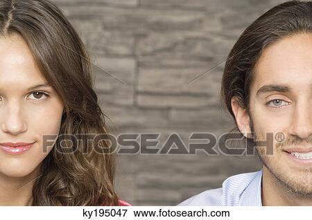 Portrait of a couple smiling View Large Photo Image Stock Photo - Portrait of a couple smiling. Fotosearch