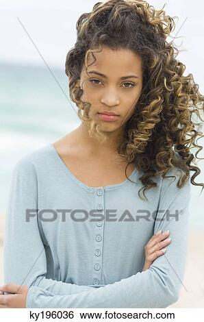 Portrait of a girl looking sad View Large Photo Image Stock Photograph - Portrait of a girl looking sad. Fotosearch