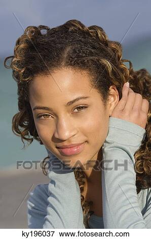 Portrait of a girl smiling View Large Photo Image Stock Photo - Portrait of a girl smiling. Fotosearch