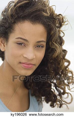 Portrait of a girl smiling View Large Photo Image Stock Photograph - Portrait of a girl smiling. Fotosearch