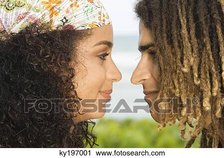 Affectionate couple looking at each other View Large Photo Image Stock Image - Affectionate couple looking at each other. Fotosearch