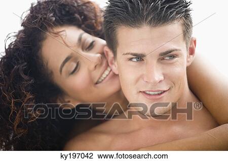 Close-up of a couple romancing View Large Photo Image Stock Image - Close-up of a couple romancing. Fotosearch