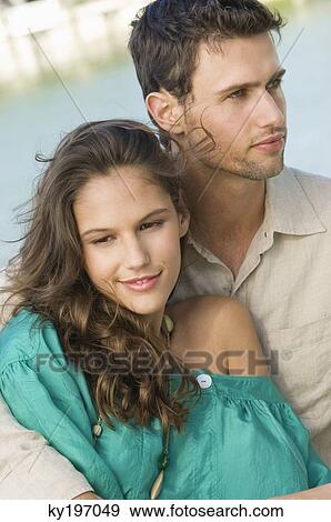 Stock Photo - Close-up of a couple romancing. Fotosearch