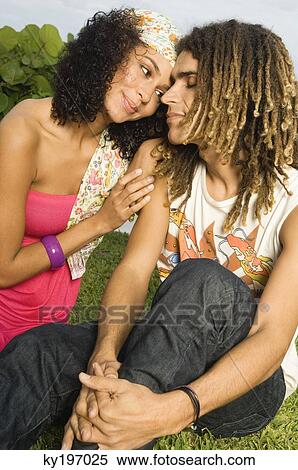 Stock Photography - Close-up of a couple romancing. Fotosearch